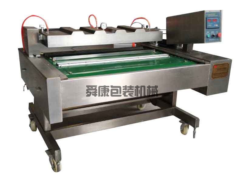 DZ-1100型自動(dòng)真空包裝機(圖1) DZ-1100型自動(dòng)真空包裝機(圖1)